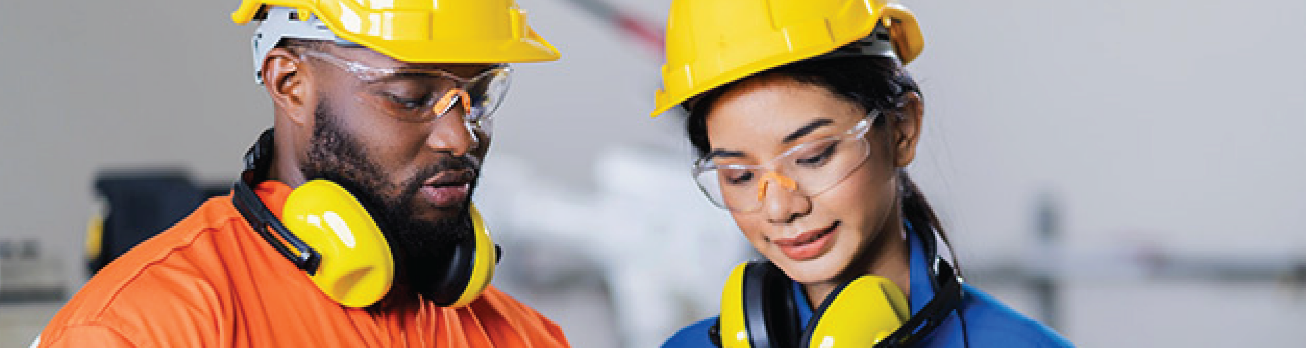 Two Stem students learning and wearing safety gear